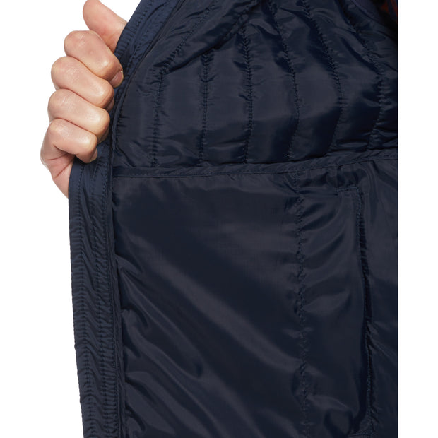 Poly Fill Vertical Channel Vest In Dark Sapphire